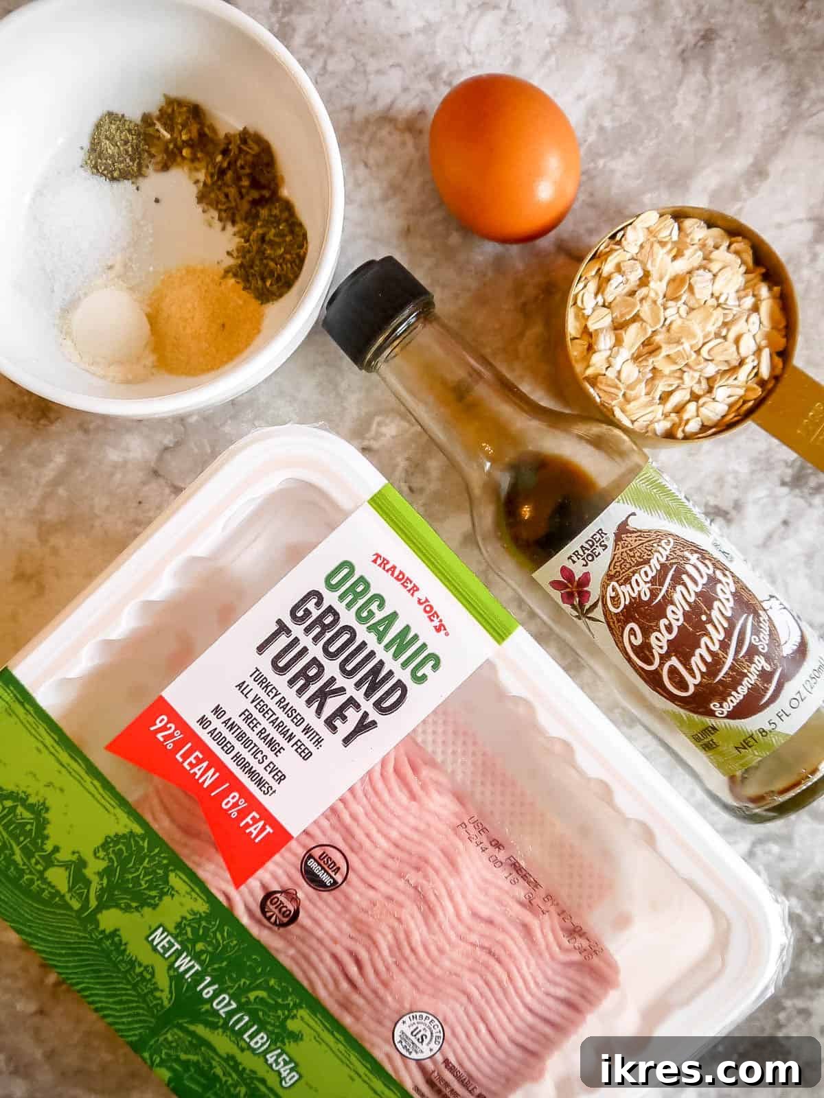 Gluten Free Dairy Free Turkey Meatballs with Oats 3 All the fresh and dry ingredients meticulously laid out, ready to be combined to make turkey oat meatballs.