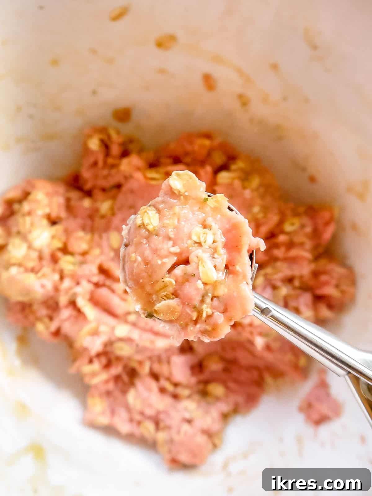 Gluten Free Dairy Free Turkey Meatballs with Oats 6 A cookie scoop used to portion out the meatball mixture, forming a perfect sphere.