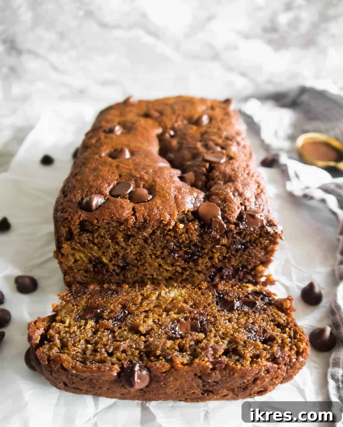 Decadent Espresso Chocolate Chip Banana Bread Paleo Gluten Free Dairy Free 11 A top-down view of gluten-free, dairy-free banana bread with espresso and chocolate chips, showcasing its rich texture.