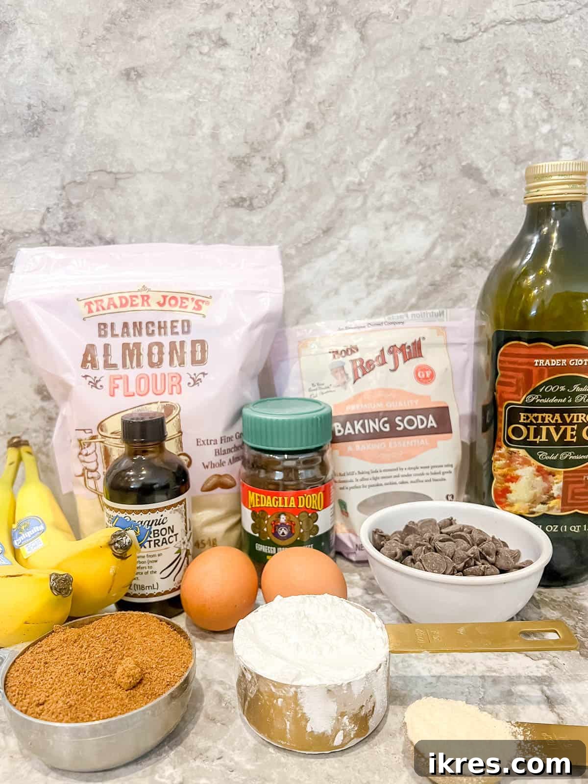 Decadent Espresso Chocolate Chip Banana Bread Paleo Gluten Free Dairy Free 4 All ingredients required to make Espresso Banana Bread with chocolate chips laid out on a table.