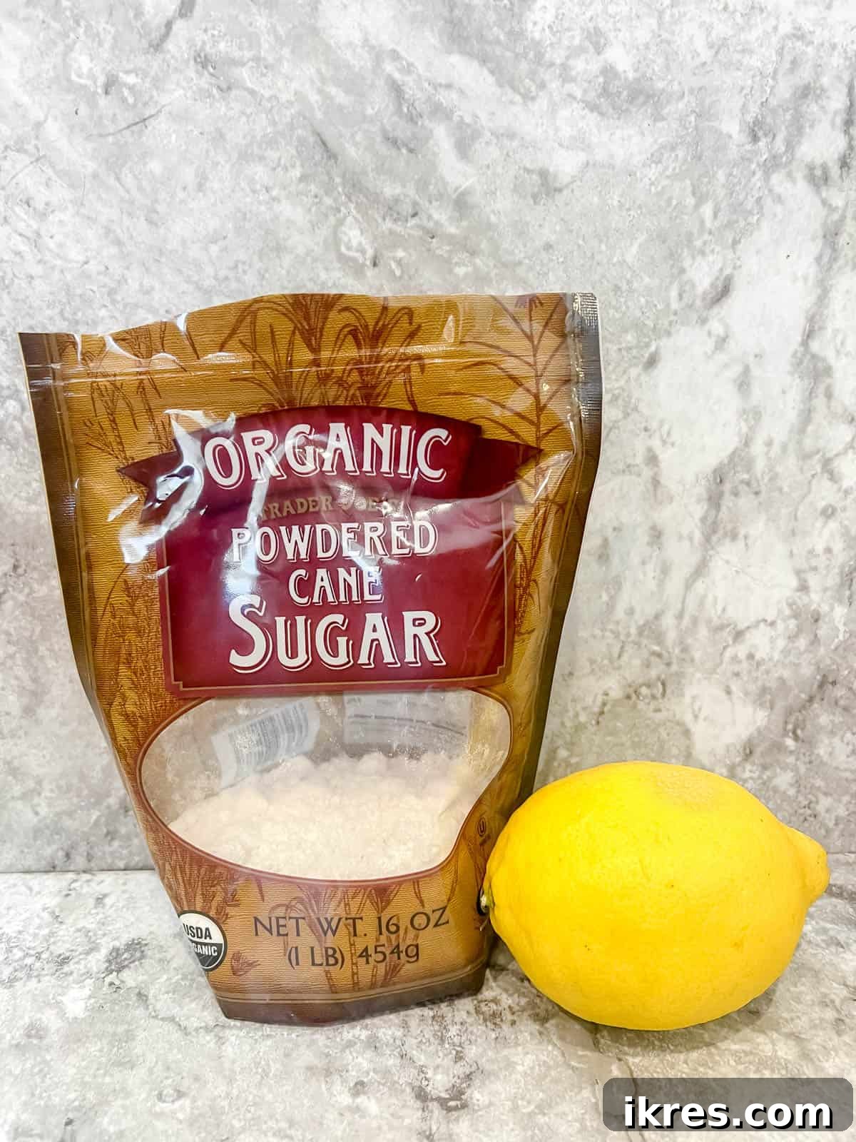 Zesty Paleo Lemon Poppy Seed Banana Bread 5 Ingredients specifically for the tangy lemon glaze, including powdered sugar and fresh lemons.