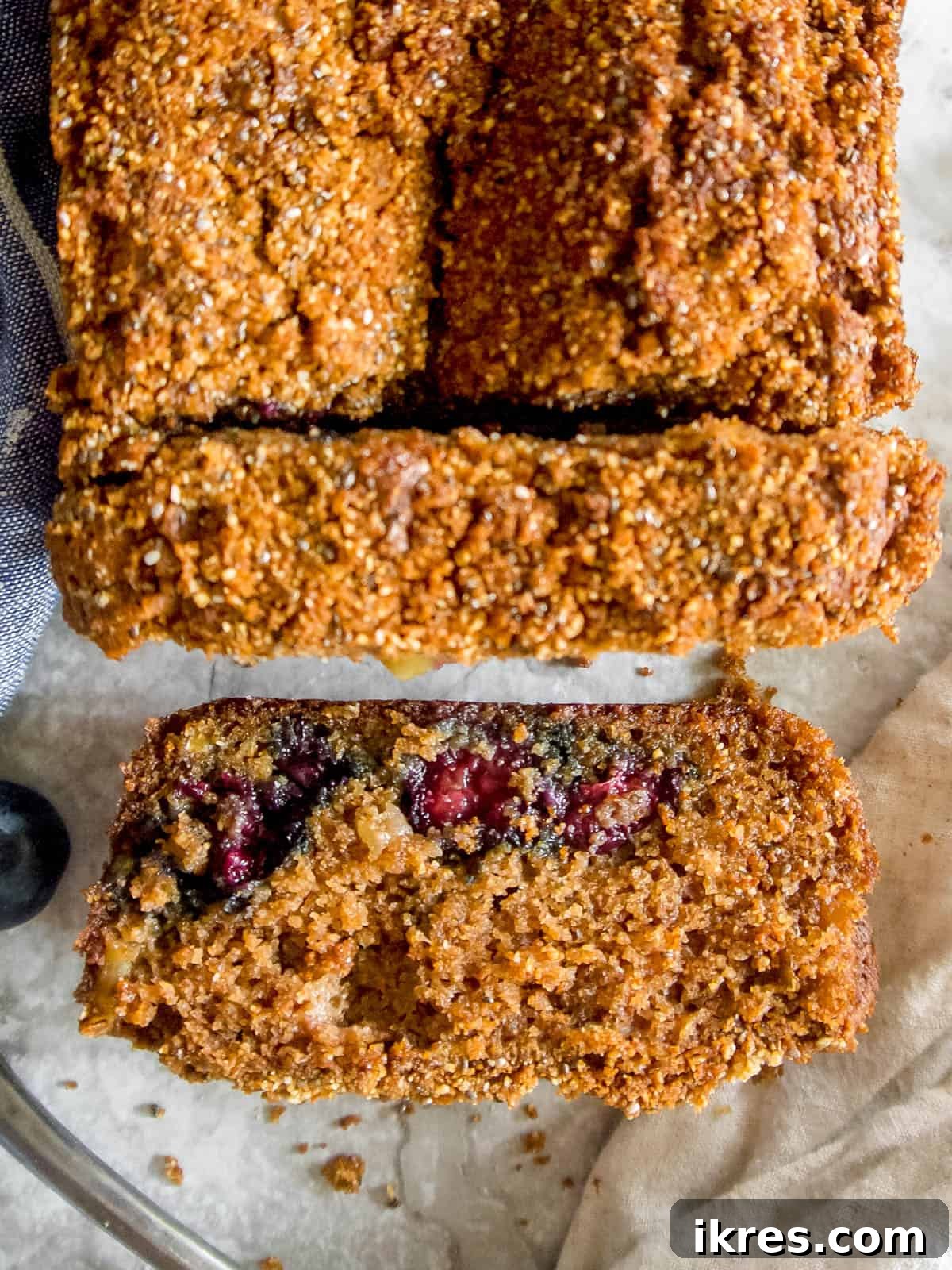 A glorious slice of Paleo apple bread, perfectly baked and ready to enjoy, resting on a table.