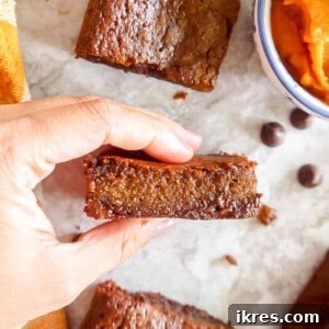 Gluten-free Chocolate Pumpkin Brownies cut into pieces, ready to serve.