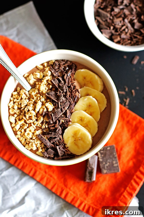 Velvety Peanut Butter Chocolate Smoothie Delight 2 This Chocolate and Peanut Butter Smoothie Bowl is perfect for breakfast or an afternoon snack. Jeanniestriedandtruerecipes.com