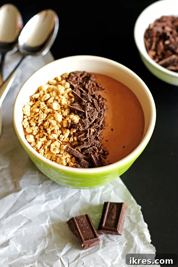Velvety Peanut Butter Chocolate Smoothie Delight 3 This Chocolate Peanut Butter Smoothie Bowl is perfect for breakfast or an afternoon snack.