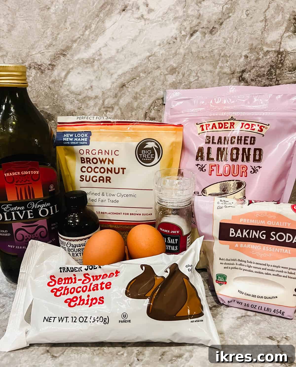 Deliciously Wholesome Almond Flour Brownies 4 All ingredients required for making healthy almond flour brownies: a bottle of olive oil, dairy-free chocolate chips, coconut sugar, eggs, almond flour, baking soda, vanilla extract, and salt.