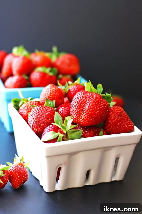 Refreshing Fruit Freezes 4 Strawberries in white and blue quart containers