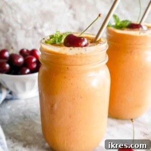 Creamy Cherry Mango Carrot Greek Yogurt Smoothie 6 A close-up of the delicious Cherry Mango Carrot Smoothie, showcasing its smooth texture and rich color.