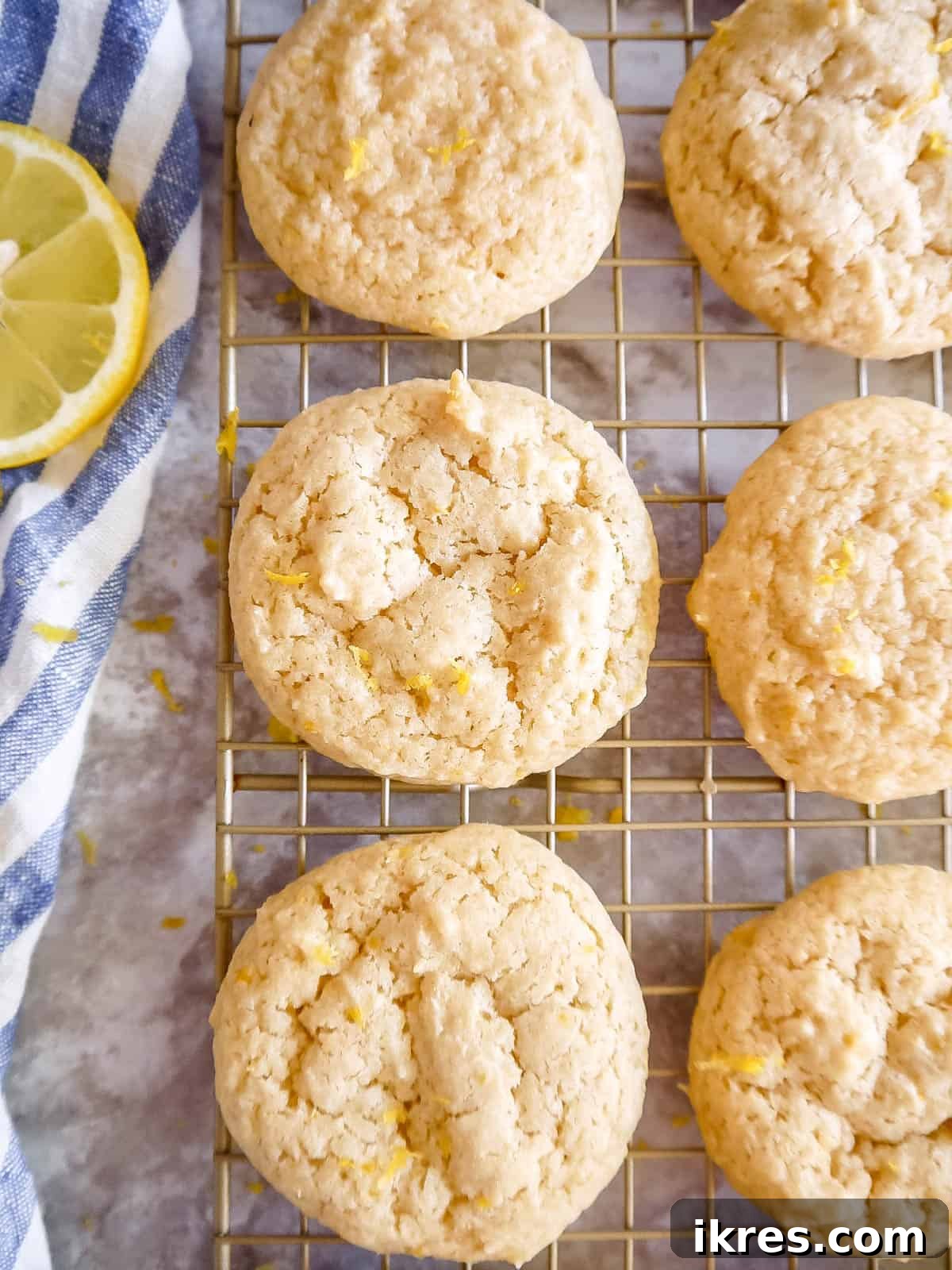 Freshly baked Lemon Sugar Cookies with Olive Oil cooling on a wire rack, ready to be enjoyed.