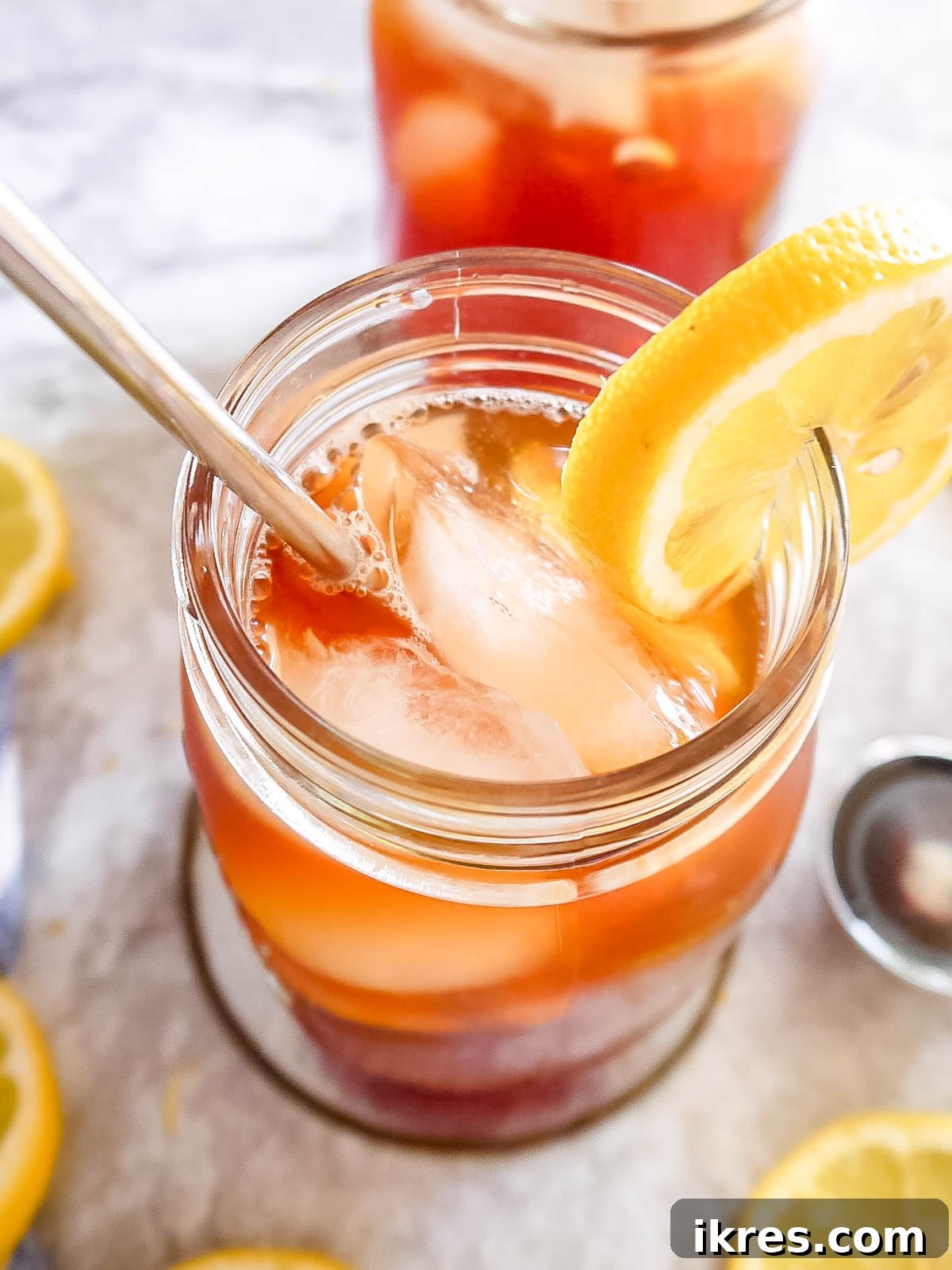 Sugar free iced tea in a glass with a slice of lemon, emphasizing its refreshing and healthy appeal.