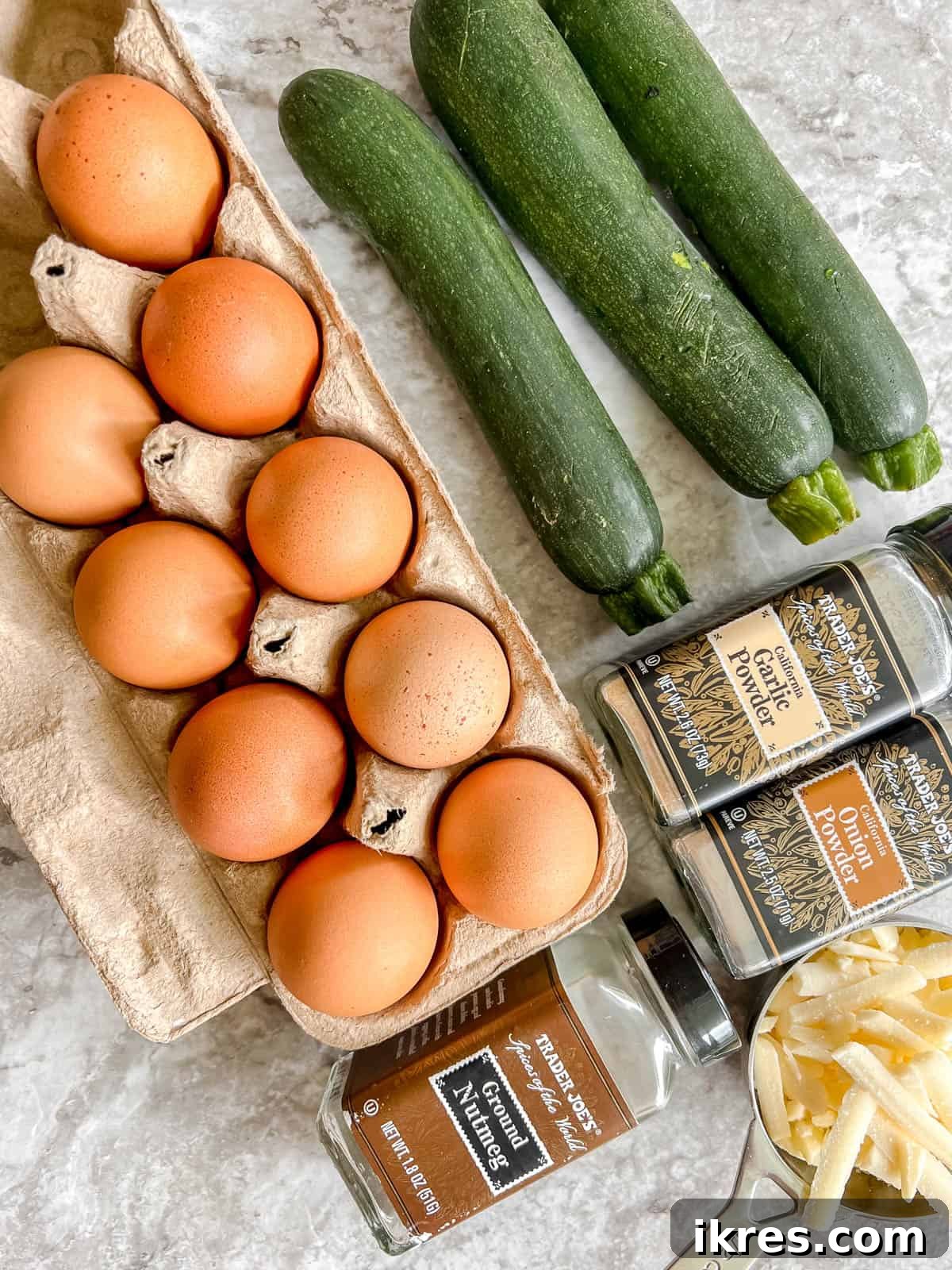 Ingredients needed to make Zucchini Egg Muffin Cups.