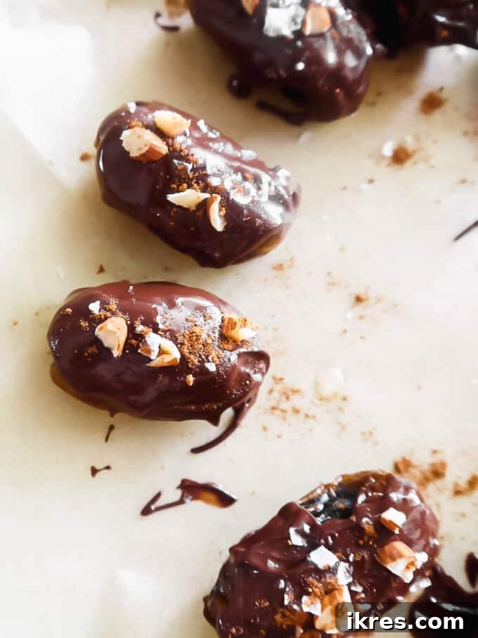 Chocolate covered dates with sea salt, crushed almonds, and pumpkin spice sprinkled on top.