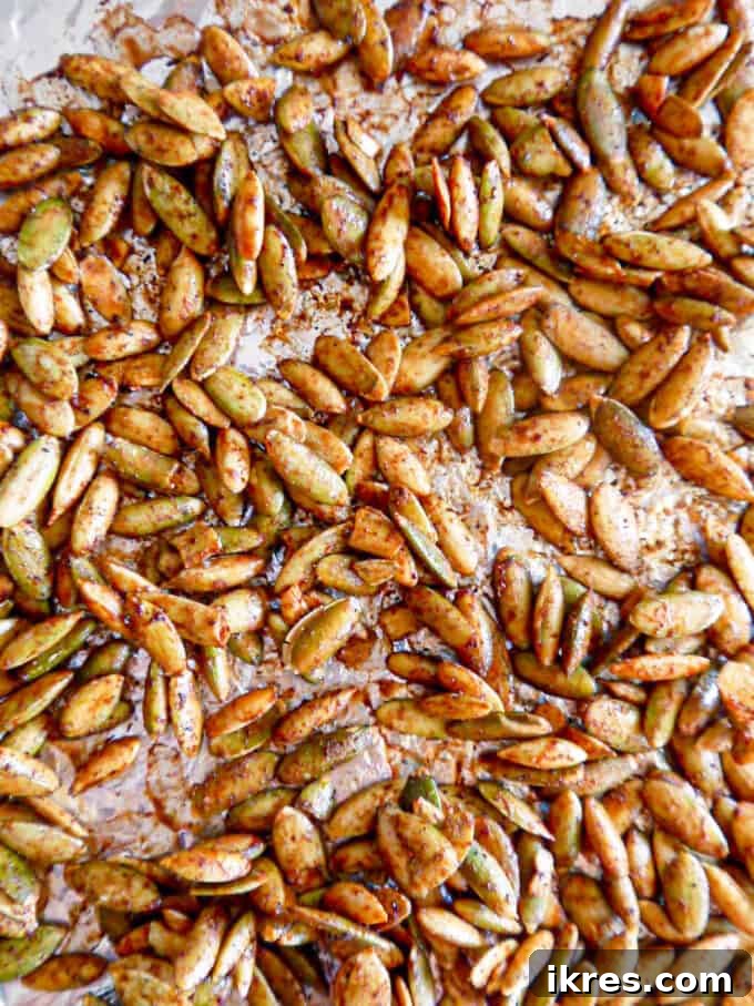 Autumn Orchard Chocolate Bark with Pepita Crunch 5 Roasted pepitas coated in maple syrup and autumn spices, spread evenly on a baking pan.