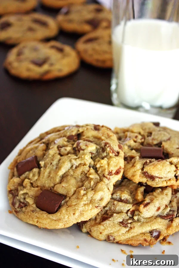 Decadent Peanut Butter Chocolate Chip Cookies 2 Deliciously soft and chewy jumbo peanut butter chocolate chip cookies cooling on a wire rack.