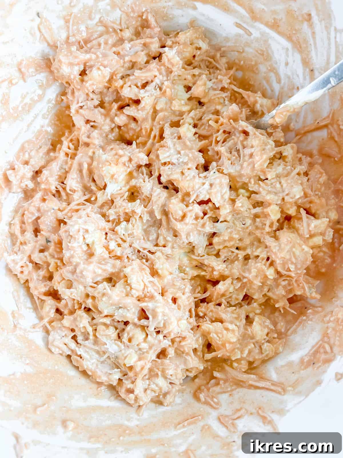 Buffalo dip mixed together until all ingredients are well combined and smooth.