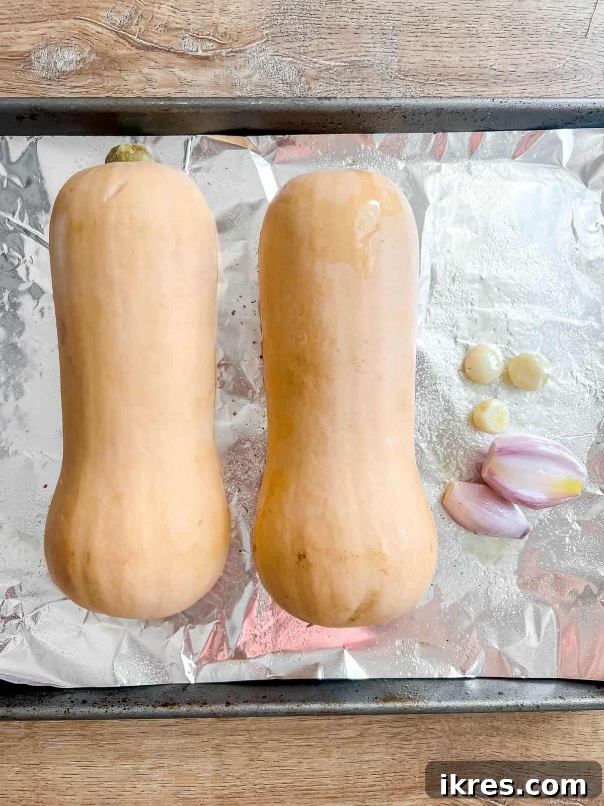 Butternut squash before baking in a pan.
