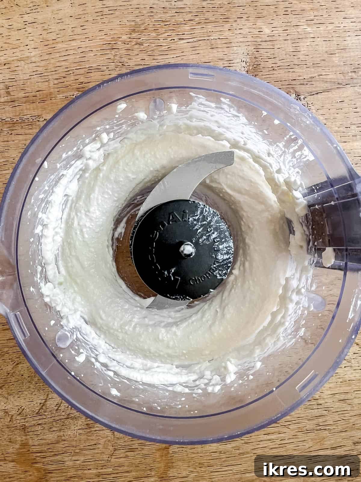 Whipped Cottage Cheese Potatoes 4 Cottage cheese being processed in a food processor until it reaches a smooth, creamy consistency, ready to be incorporated into the mashed potatoes.