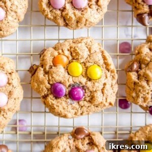 Flourless monster cookies on a cooling rack.