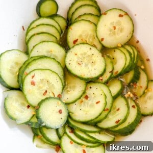 Close-up of Quick Asian pickled cucumbers in a small serving bowl.