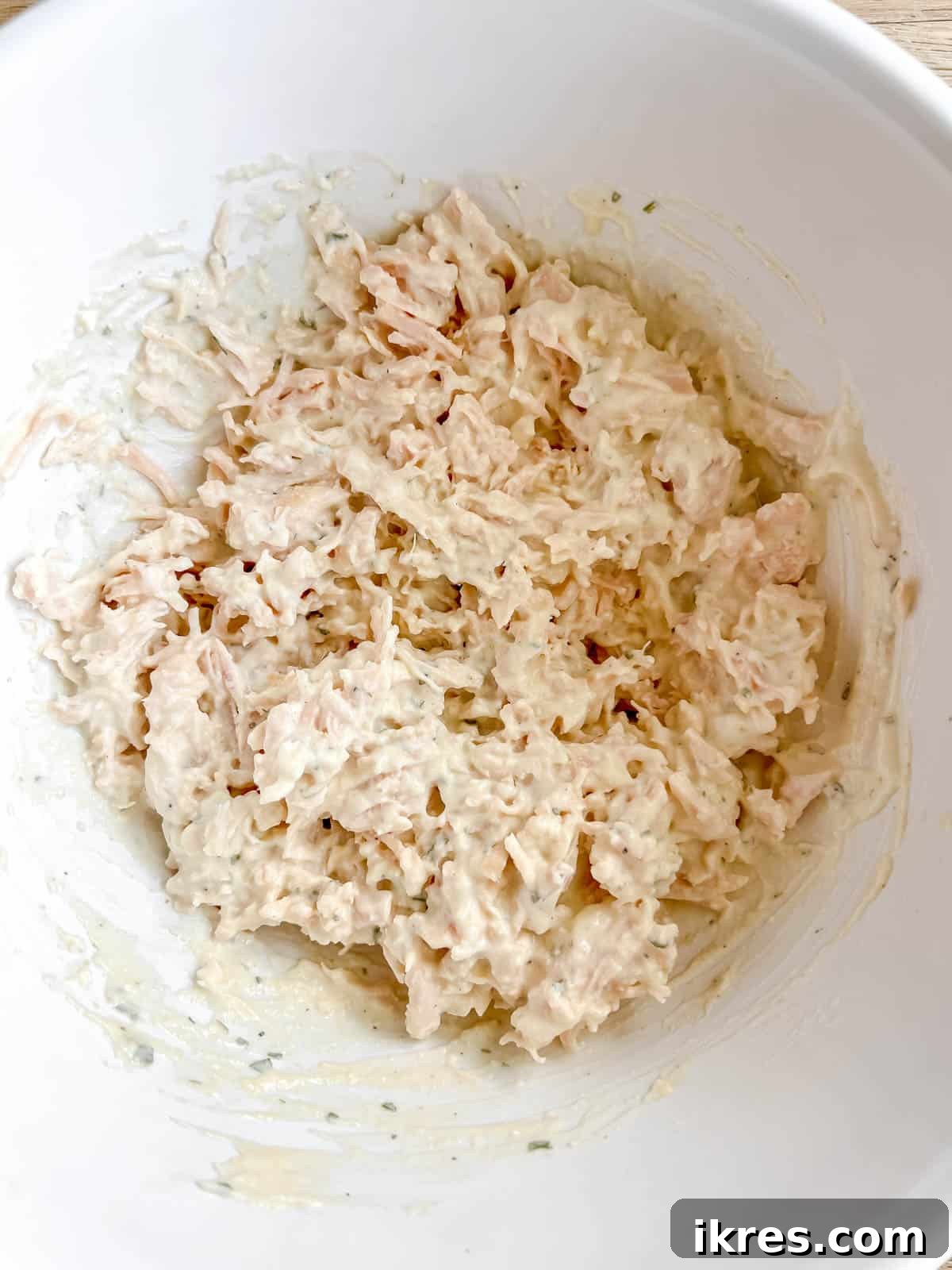 Canned chicken added to the Greek yogurt mixture.