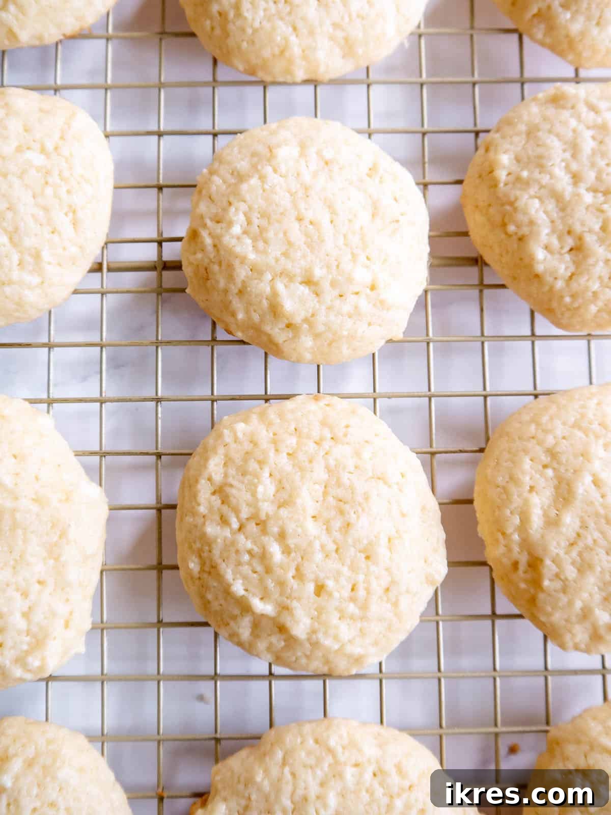 Pillowy Cottage Cookies 3 Freshly baked cottage cheese cookies cooling on a wire rack.