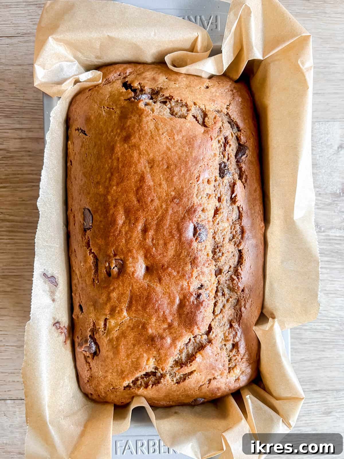 Greek yogurt banana bread in a pan after baking.