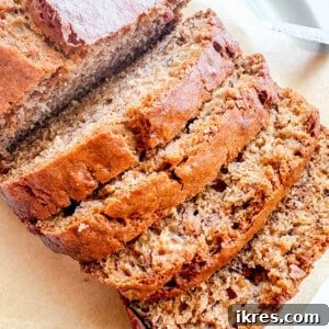 Slices of olive oil banana bread on a plate.