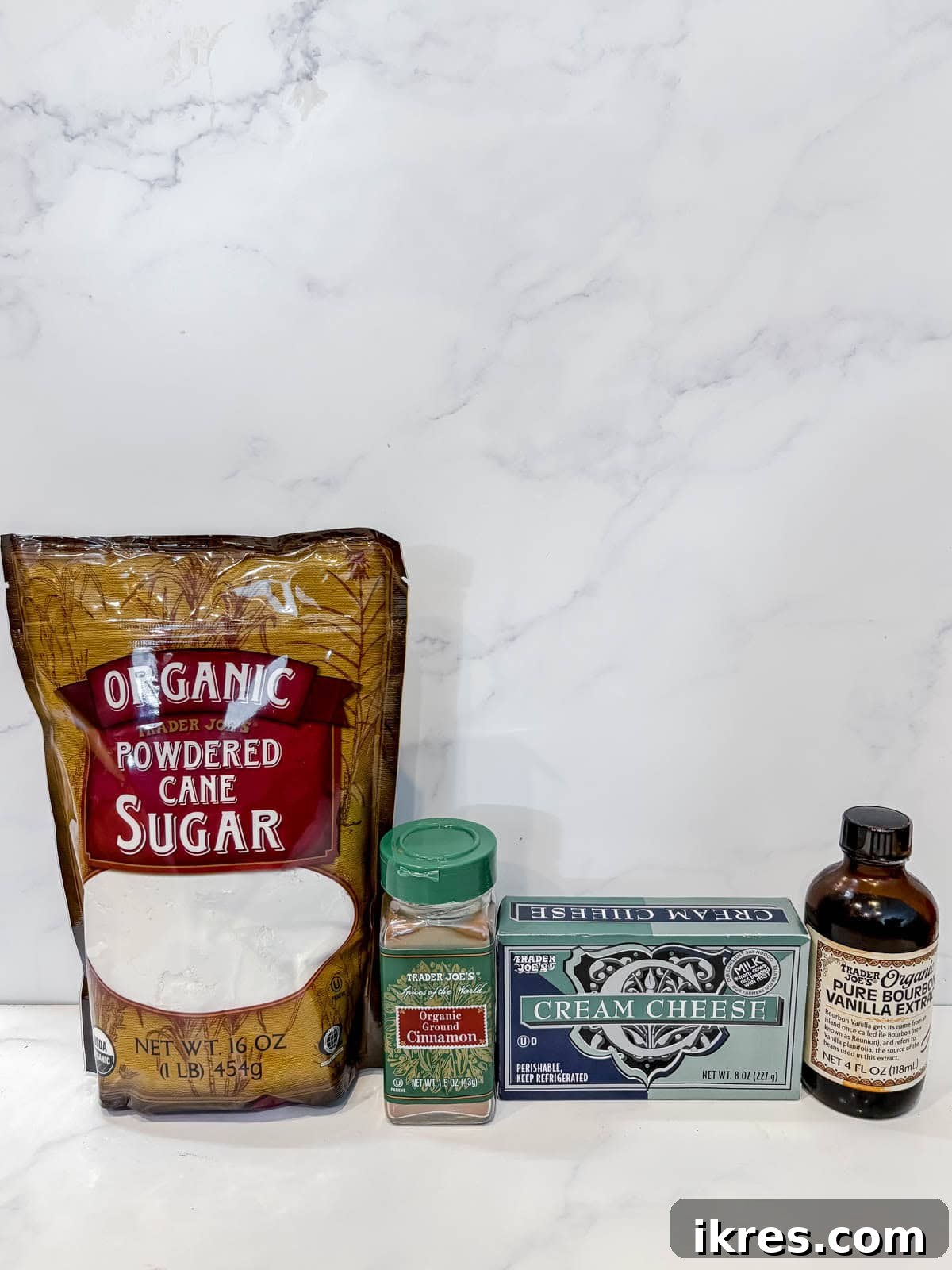 Spiced Gingerbread Cake with Tangy Cinnamon Cream Cheese Frosting 5 Ingredients for Cinnamon Cream Cheese Frosting: cream cheese, powdered sugar, vanilla extract, and cinnamon.
