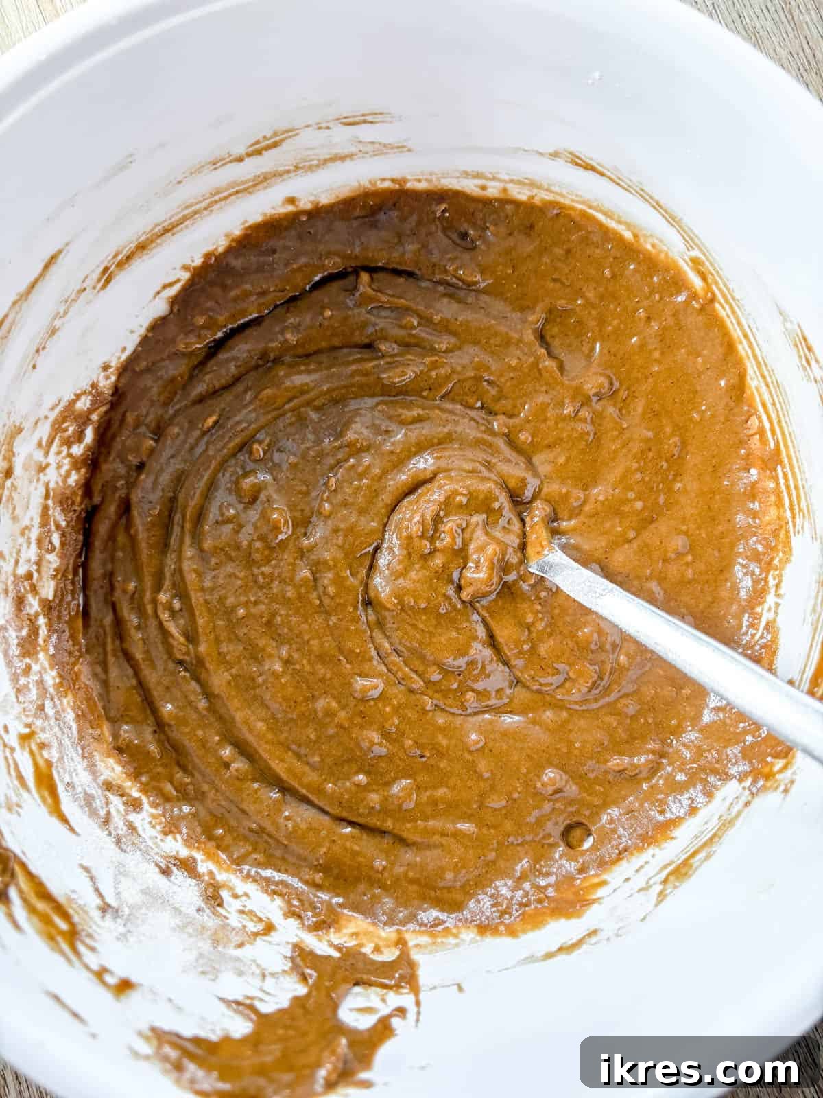 Spiced Gingerbread Cake with Tangy Cinnamon Cream Cheese Frosting 8 Gingerbread Cake batter in a bowl, showing a smooth, consistent mixture.