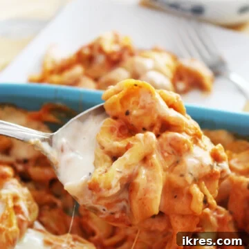 Close-up of baked tortellini with melted cheese