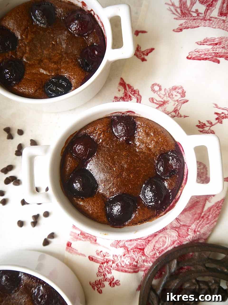 Freshly baked gluten-free chocolate cherry cake in a ramekin.