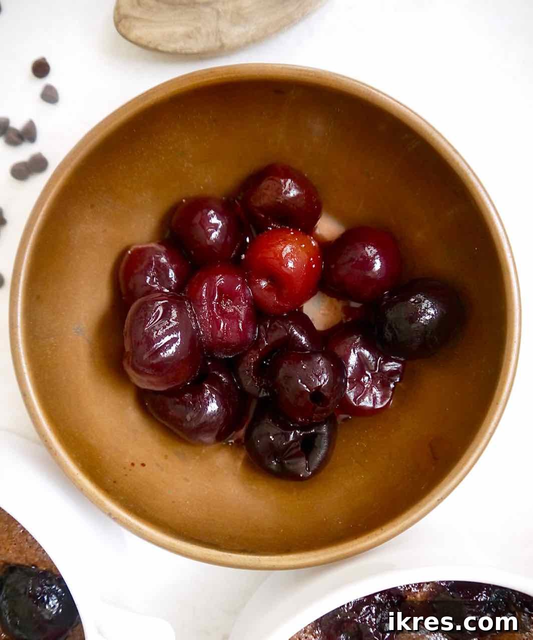 Pitted cherries in a bowl, ready for use.