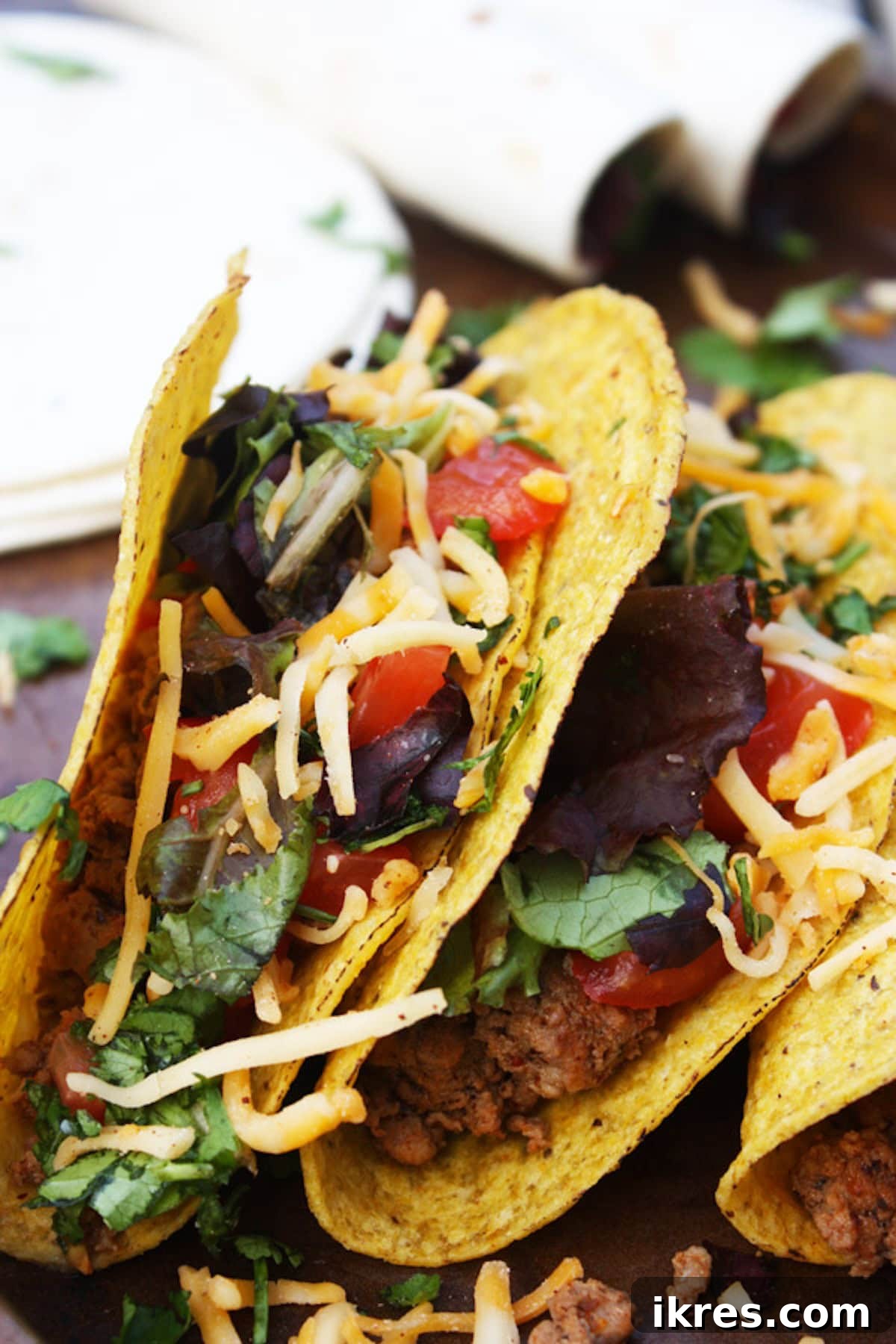 Taco Extravaganza 5 Crispy hard shell tacos arranged on a serving platter