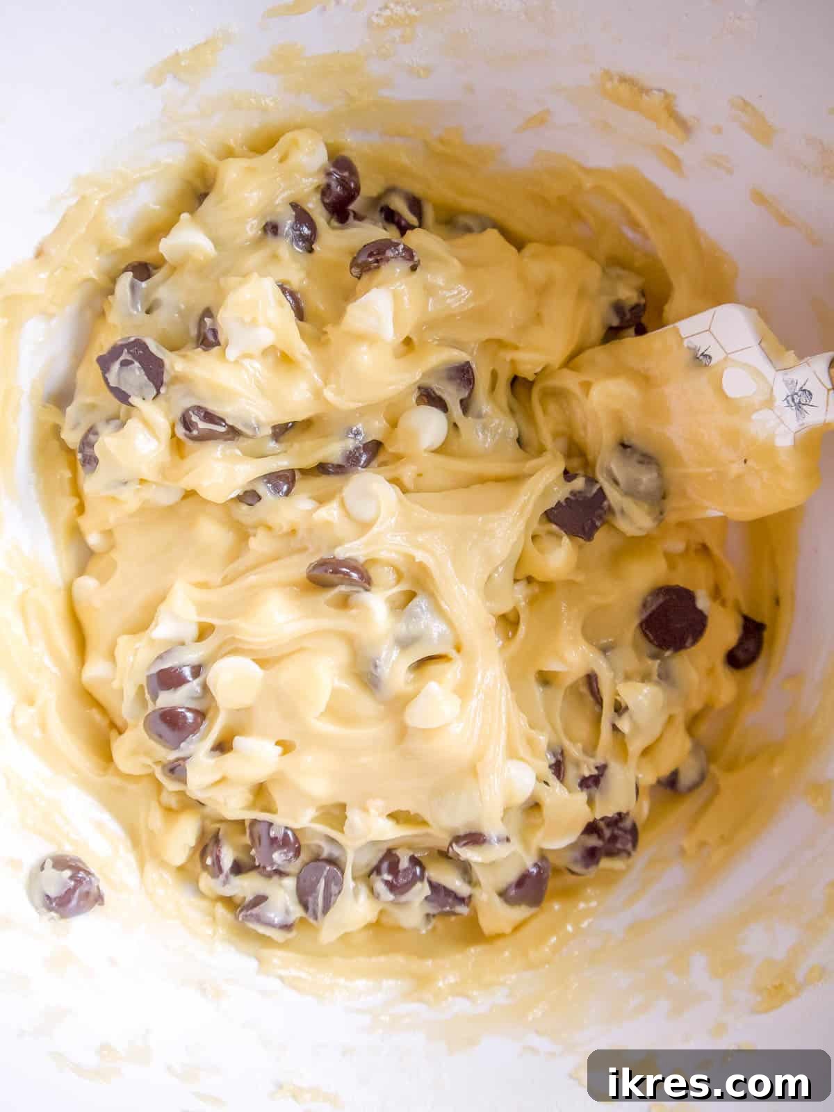 White and dark chocolate chips folded into brownie batter.