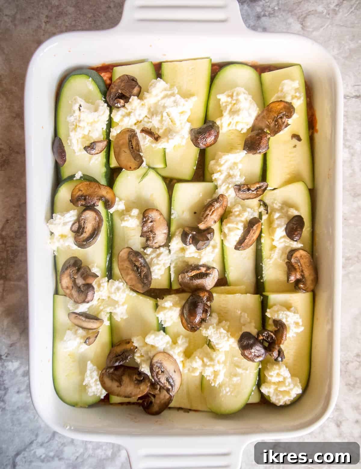 Zucchini Lasagna Reimagined: Gluten-Free, Meaty, and Mushroom Packed 8 The creamy goat cheese and savory mushroom layer beautifully added to the zucchini lasagna assembly.