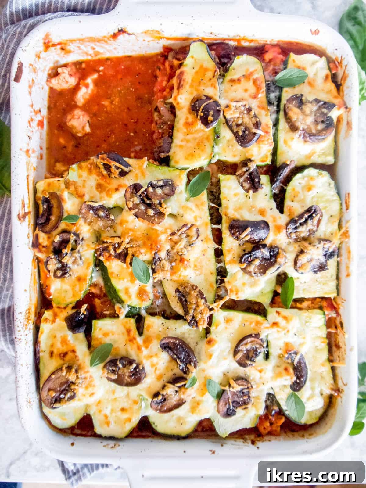 Zucchini Lasagna Reimagined: Gluten-Free, Meaty, and Mushroom Packed 10 The freshly baked zucchini Lasagna with Meat Sauce and Mushrooms, golden and bubbly, straight from the oven.