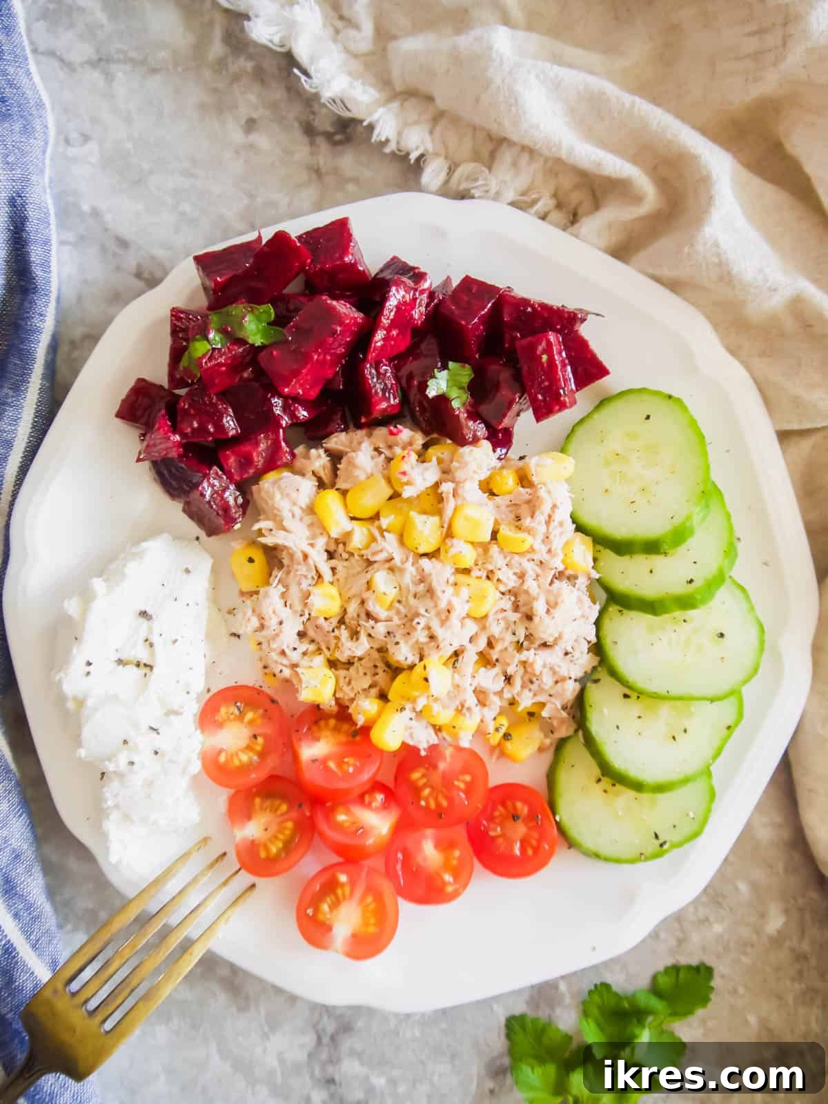 Provencal Beet Salad with Tangy Mustard Vinaigrette 6 A beautifully arranged plate featuring a variety of fresh salads, including a vibrant French beetroot salad, perfect for a healthy spread.