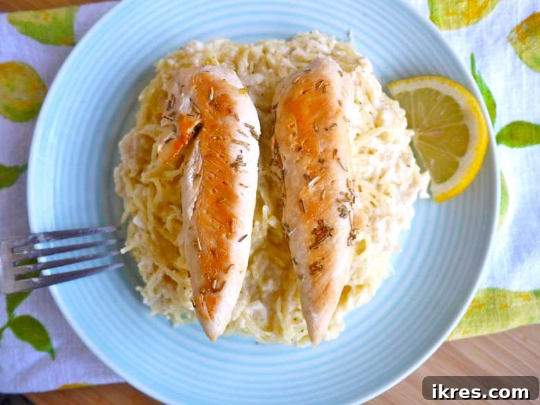 Zesty Paleo Alfredo Spaghetti Squash 7 A dish of creamy Lemon Alfredo Spaghetti Squash, a healthy pasta alternative