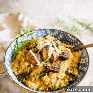 Mushroom Quinoa Risotto in a bowl with Parmesan on top.