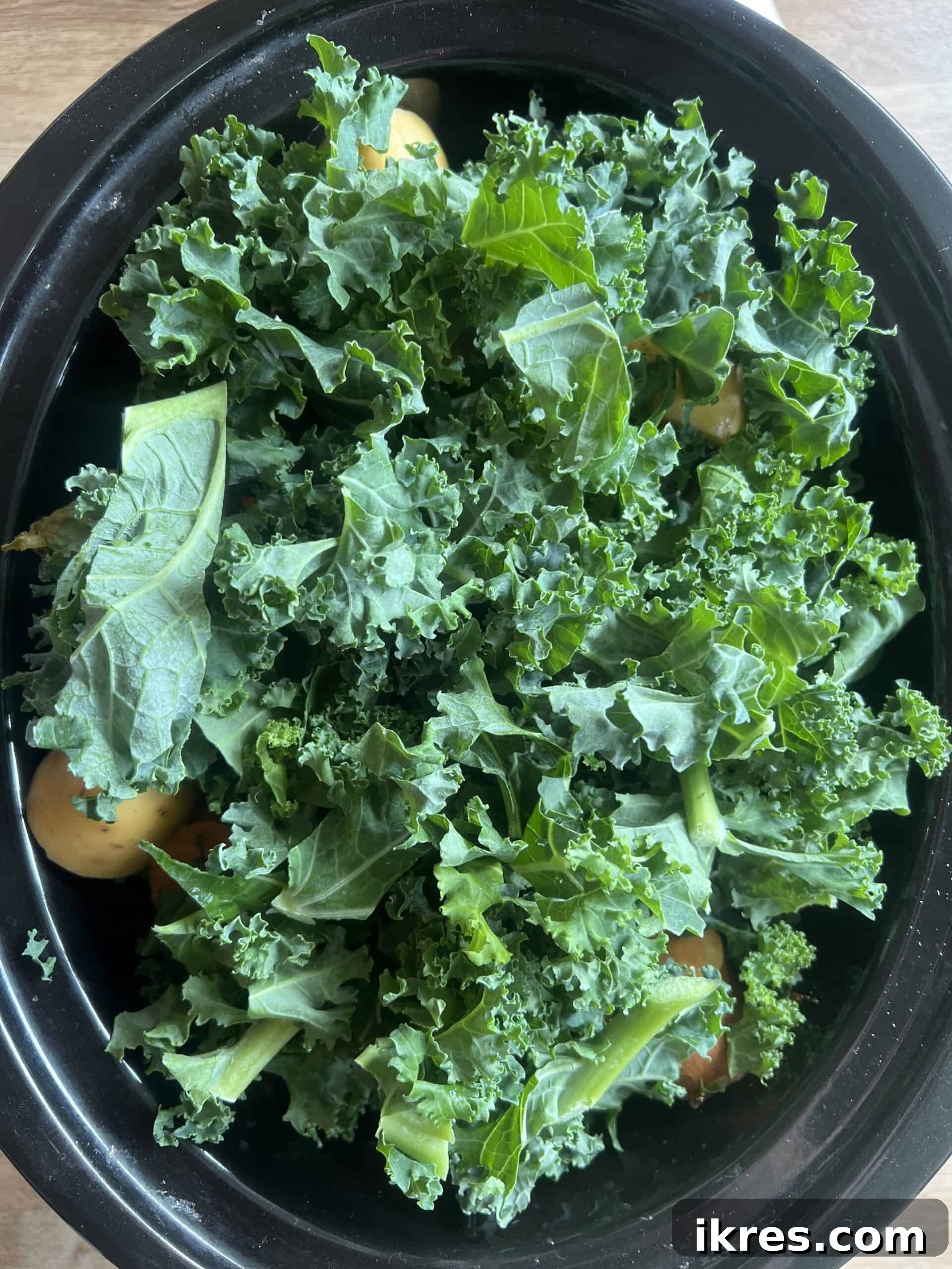Nourishing Creamy Beef Stew with Kale and Tomato Paleo Gluten Free 7 The rest of the ingredients in the crockpot prior to cooking.