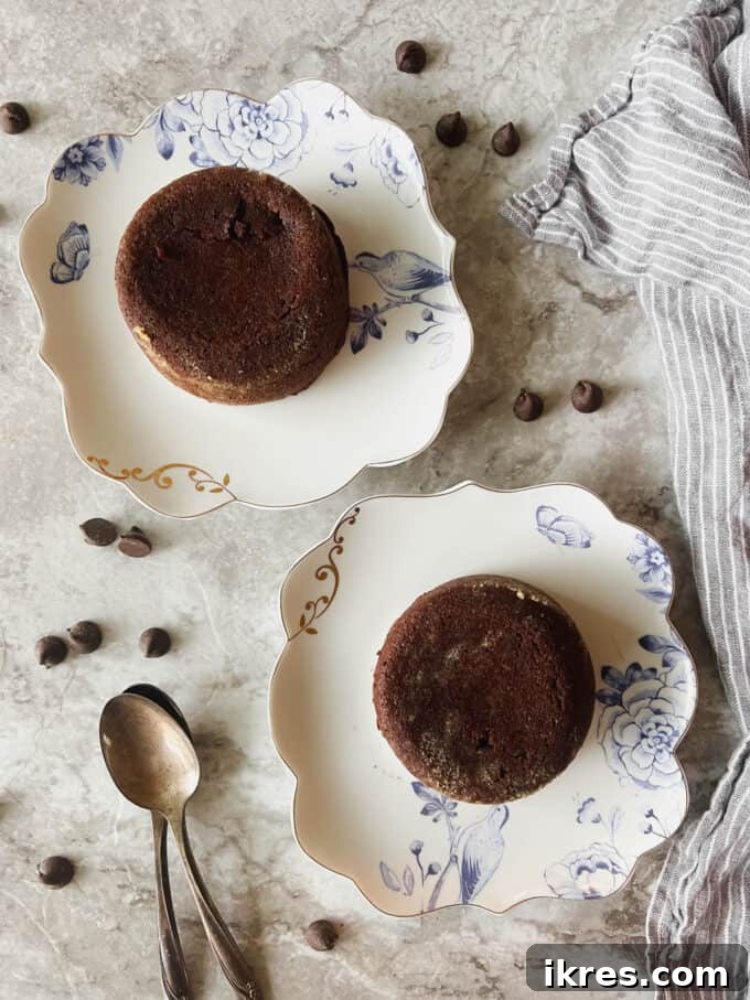 Decadent Gluten Dairy Free Molten Lava Cakes 11 Molten chocolate lava cakes carefully inverted onto dessert plates.