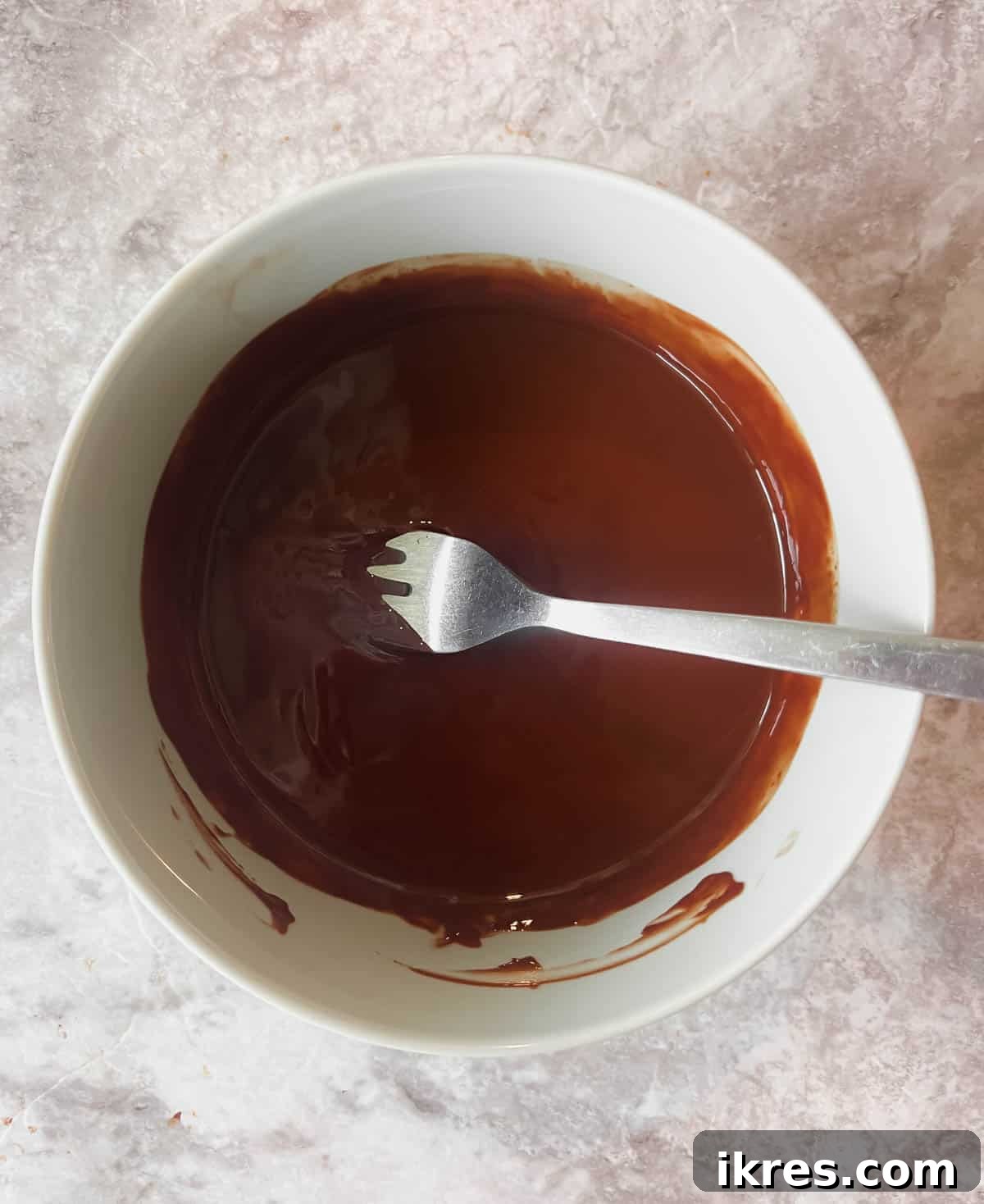 Melted chocolate in a bowl.