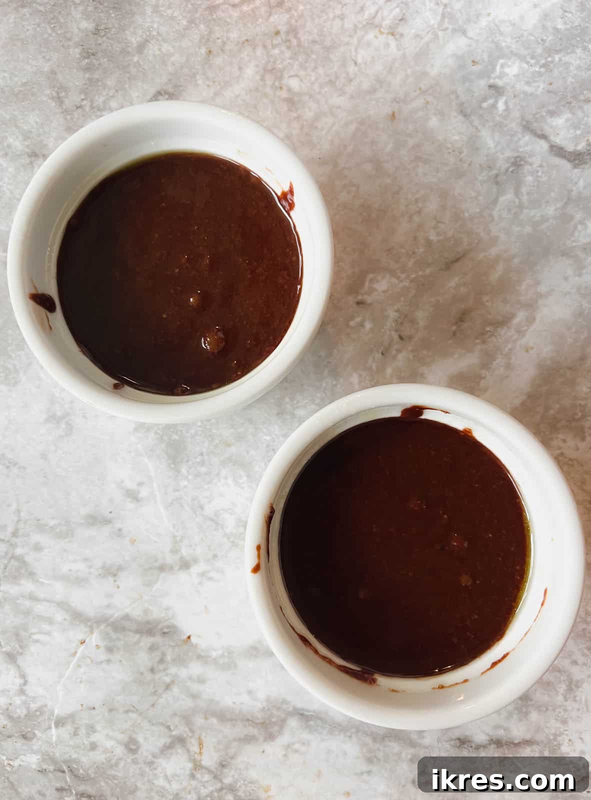 Batter added to each ramekin.