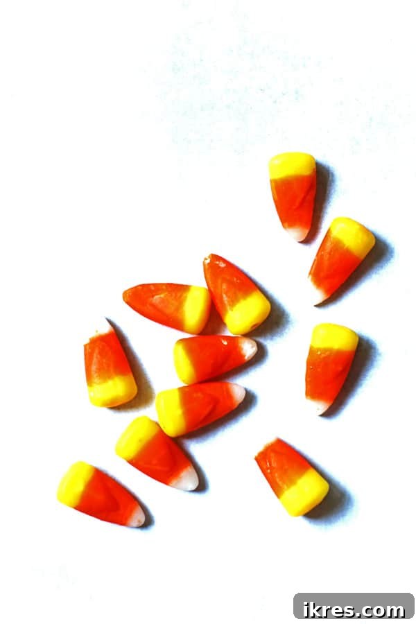 Sweet & Salalty Candy Corn Crunch 3 Candy Corn on a white table, highlighting the main sweet ingredient.