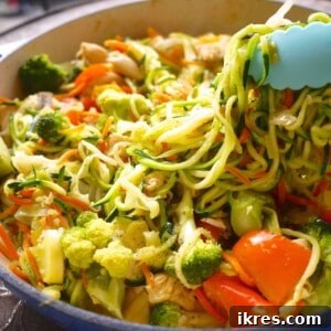 Paleo Stir Fry with Zoodles and Chicken in a large pan.