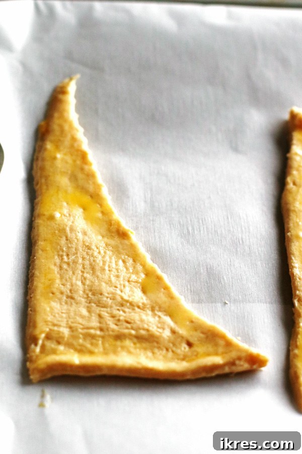 Bewitching Calzone Caps 7 Crescent roll with egg mixture on edges