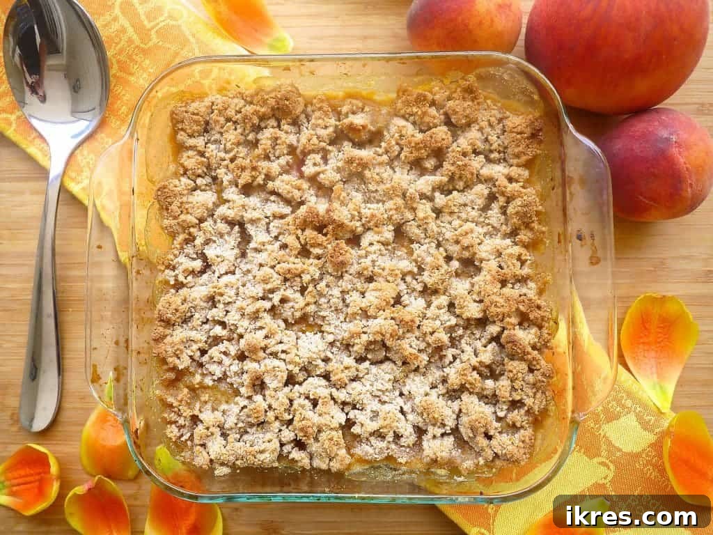 Wholesome Paleo Peach Crumble 2 Almond flour crumble topping mixture ready for baking.