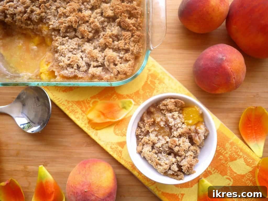 Wholesome Paleo Peach Crumble 4 Paleo Peach Crumble freshly baked and golden brown.