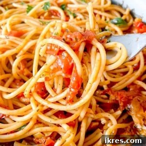 Bursting Cherry Tomato Garlic Sauce 10 Cherry tomato sauce with garlic mixed into spaghetti.