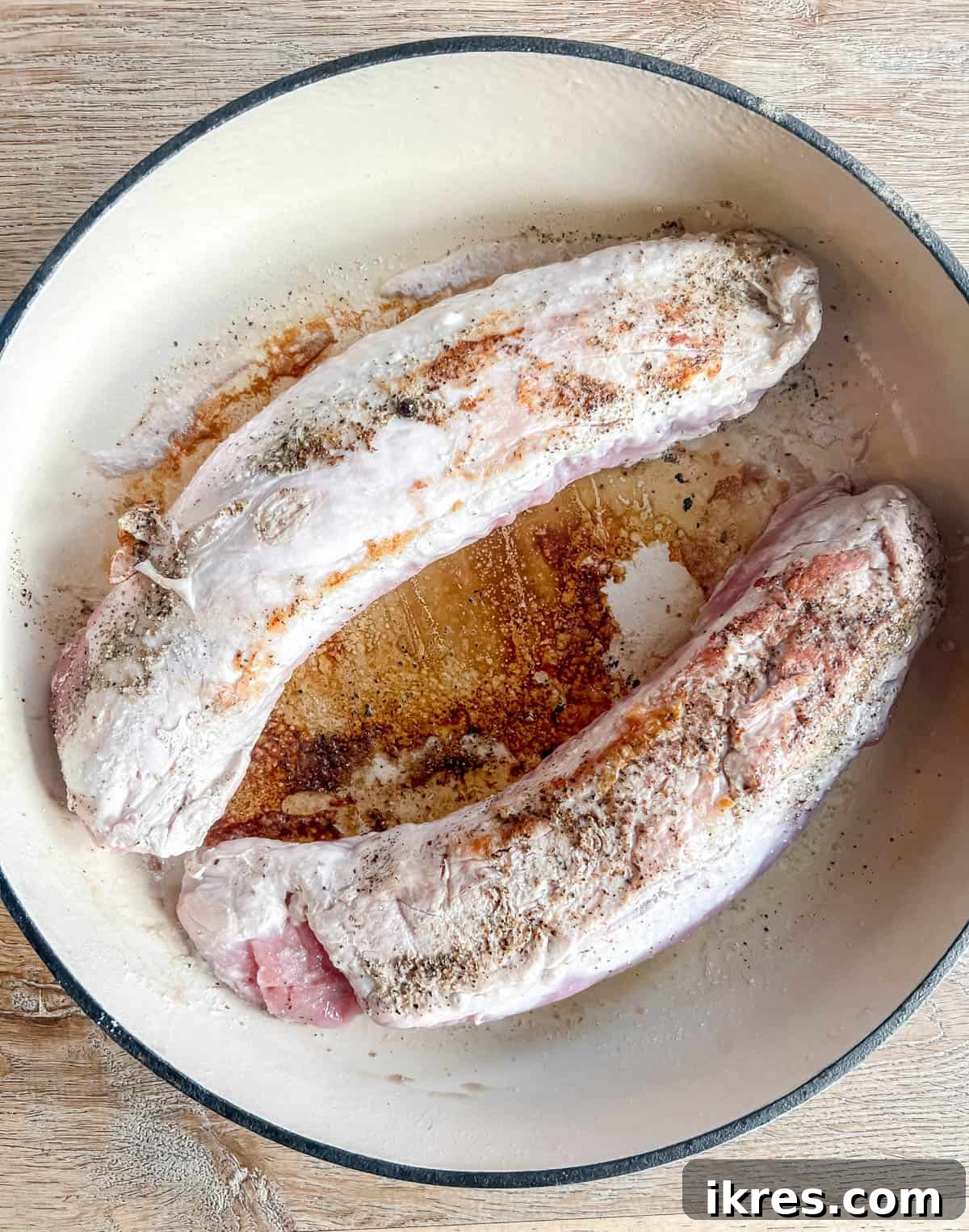 Sweet and Savory Dutch Oven Pork Tenderloin with Apples and Figs 4 Seared pork tenderloin ready for the Dutch oven, golden brown and juicy.